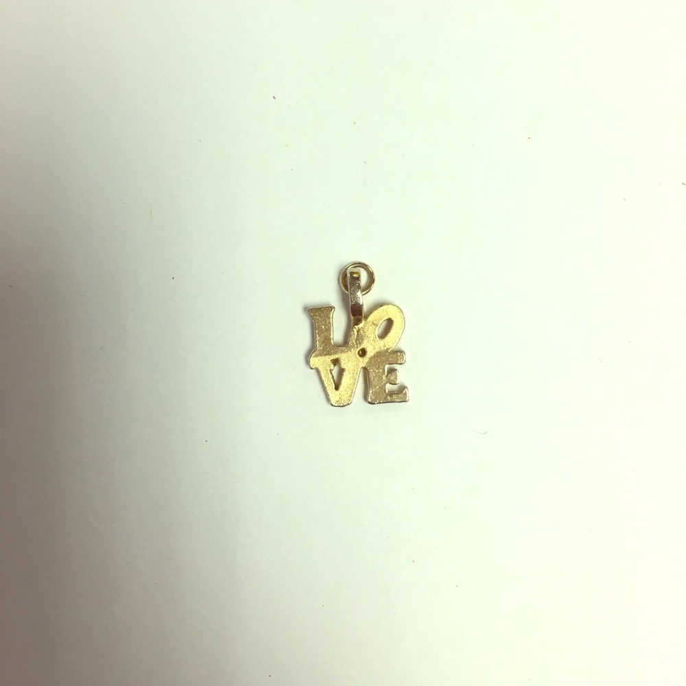 Metal LOVE charm.